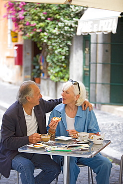 Senior tourists having breakfast in a local cafe, Rome, Lazio, Italy, Europe