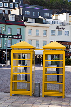 Yellow telephone boxes, St. Helier, Jersey, Channel Islands, United Kingdom, Europe