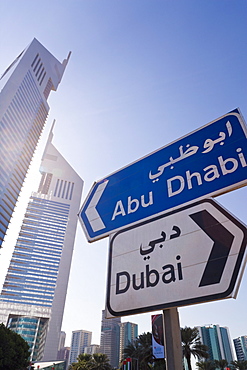 Street sign in front of the Emirates Towers on Sheikh Zayed Road, Dubai, United Arab Emirates, Middle East