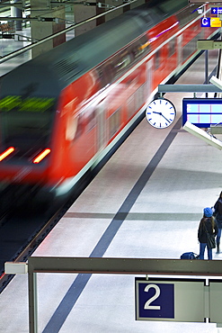 Train pulling into the platform at new modern main railway station, Berlin, Germany, Europe