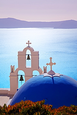 Bell Tower of Orthodox Church overlooking the Caldera in Fira, Santorini (Thira), Cyclades Islands, Aegean Sea, Greek Islands, Greece, Europe