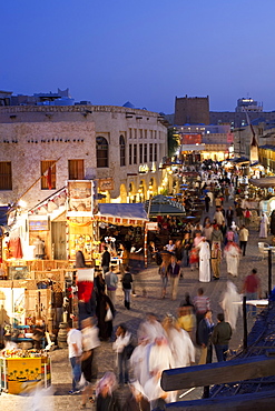 The restored Souq Waqif with mud rendered shops and exposed timber beams, Doha, Qatar, Middle East