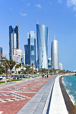 View along the Corniche towards the new skyline of the West Bay central financial district, Doha, Qatar, Middle East