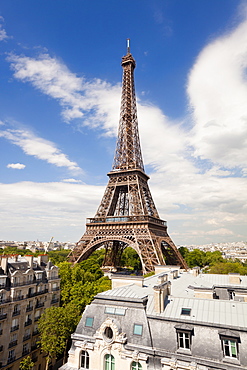 Eiffel Tower, viewed over rooftops, Paris, France, Europe