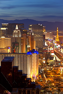 Elevated view of the hotels and casinos along The Strip at dusk, Las Vegas, Nevada, United States of America, North America