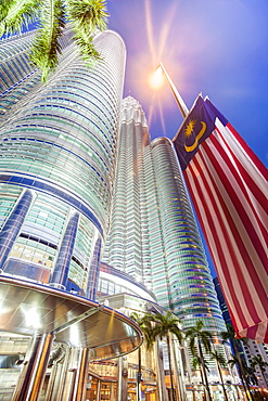 Low angle view of the Petronas Twin Towers, Kuala Lumpur, Malaysia, Southeast Asia, Asia