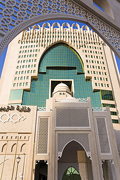 Ministry of Education building featuring a mosque dome set in the glass frontage, Doha, Qatar, Middle East