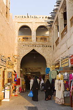 The restored Souq Waqif with mud rendered shops and exposed timber beams, Doha, Qatar, Middle East