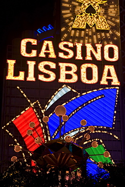 Lisboa Casino neon illuminated at night, Macau, China, Asia