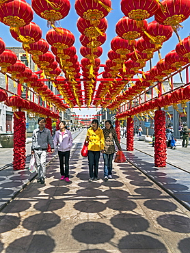 Decorative lanterns above newly rebuilt Qianmen Street, Beijing, China, Asia