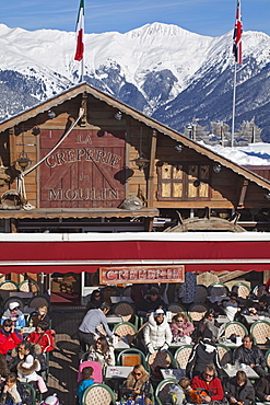 Busy cafe in Courchevel 1850 ski resort in the Three Valleys (Les Trois Vallees), Savoie, French Alps, France, Europe