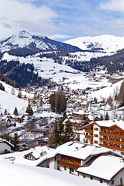 Selva Wolkenstein, Sella Ronda ski area, Val Gardena, Sella Massif range of mountains under winter snow, Dolomites, South Tirol, Trentino-Alto Adige, Italy, Europe