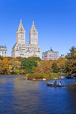 Central Park and the Grand buildings along Central Park West viewed across the lake in autumn, Manhattan, New York City, New York, United States of America, North America