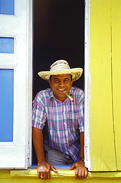 Man smoking cigar, Sosua, Dominican Republic, West Indies, Caribbean, Central America