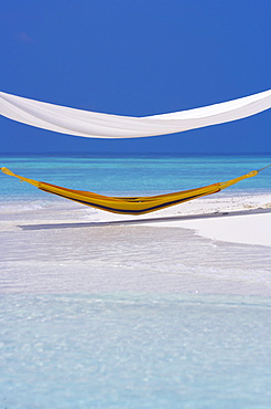 Hammock under shelter on tropical beach, Maldives, Indian Ocean, Asia