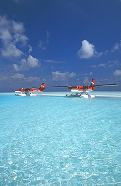 Maldivian air taxi seaplanes parked on sandbank, Maldives, Indian Ocean, Asia