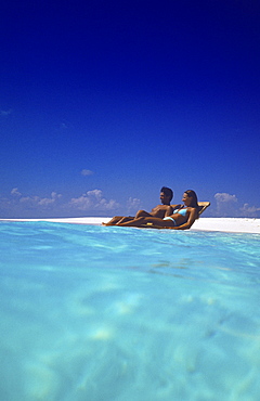 Couple on a beach, Maldives, Indian Ocean, Asia