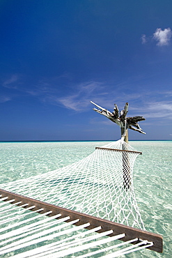 Hammock in tropical lagoon, Maldives, Indian Ocean, Asia