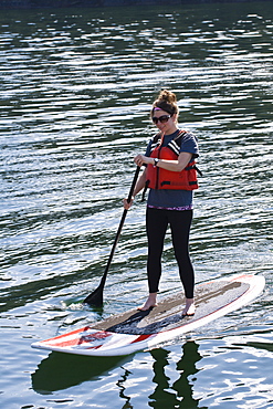 Paddleboarding in Windham Bay in the Chuck River Wilderness Area, Southeast Alaska, United States of America, North America