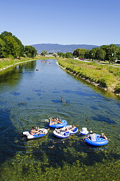 Tubing on the Penticton River, Penticton, British Columbia, Canada, North America