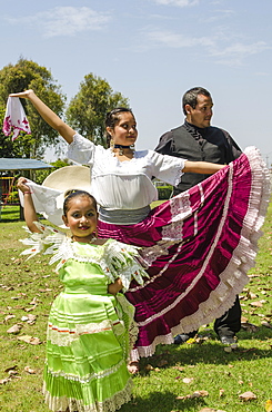 A Marinera dancer dancing a typical Peruvian dance in Trujillo, Peru, South America