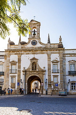 Arco da Vila (Town Gate) classical gateway which fronts the city's old medieval gate, Faro, Algarve, Portugal, Europe.