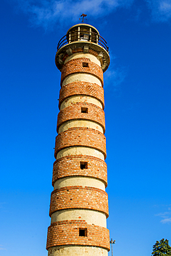 The Belem Lighthouse in Belem Tower Garden, Lisbon, Portugal