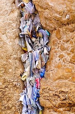 Prayer papers stuffed into the Western Wall, Jerusalem, Israel, Middle East