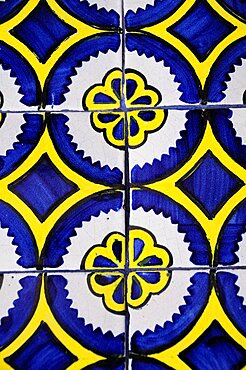 Mexico, Bajio, Queretaro, Blue white and yellow talavera tile detail.