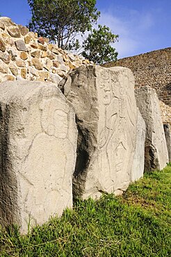 Mexico, Oaxaca, Monte Alban, Relief carved stone blocks depicting dancers.1