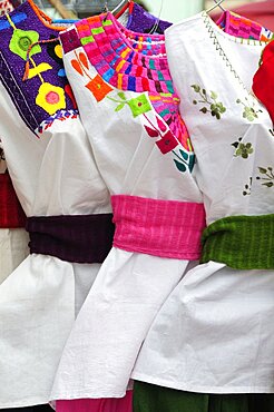 Mexico, Oaxaca, Hand embroidered blouses for sale.