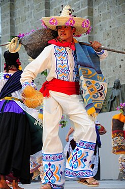 Mexico, Jalisco, Guadalajara, Plaza Tapatia Male dancer from Guerrero State performing during carnival.