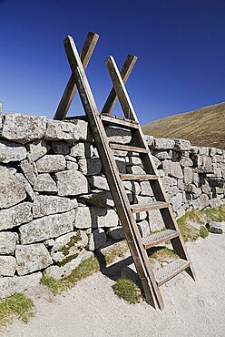 Ireland, County Down, Mourne Mountains, Typical stile over Mourne wall on Slieve Donard.