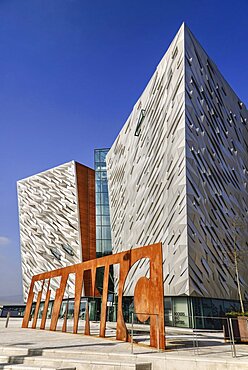 Ireland, North, Belfast, Titanic Quarter, Titanic Belfast Visitor Experience, General angular view of the building with Titanic sign outside.