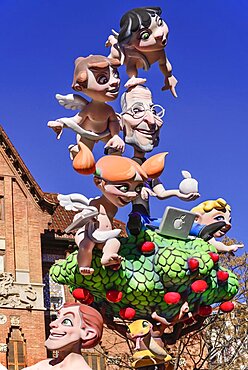 Spain, Valencia Province, Valencia, Papier Mache figures in the street during Las Fallas festival.