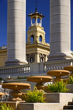 Spain, Catalunya, Barcelona, Montjuic, View through pillars of a side turret of the Palau Nacional which was built for the 1929 International Exhibition in Barcelona and now houses the National Art Museum of Catalonia.