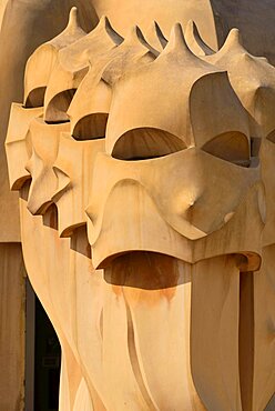 Spain, Catalunya, Barcelona, Antoni Gaudi's La Pedrera building, a section of chimney pots on the roof terrace.