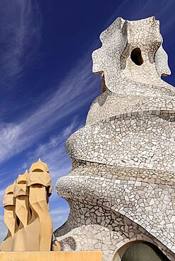 Spain, Catalunya, Barcelona, Antoni Gaudi's La Pedrera building, a section of chimney pots on the roof terrace.