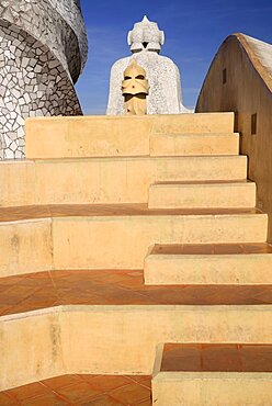 Spain, Catalunya, Barcelona, Antoni Gaudi's La Pedrera building, a section of chimney pots on the roof terrace.