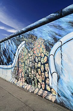 Germany, Berlin, The East Side Gallery, a 1.3 km long section of the Berlin Wall, Mural known as Ã¢â‚¬ËœIt happened in NovemberÃ¢â‚¬â„¢ by Kani Alavi.