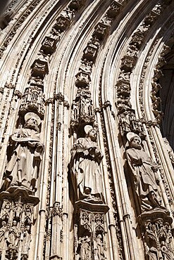 Spain, Castilla La Mancha, Toldeo, Statues of the apostles on the Cathedral porch.