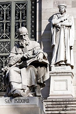 Spain, Madrid, Statues of San Isidoro & Luis Vives on the steps outside the National Library.