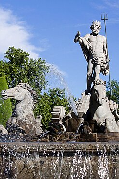 Spain, Madrid, The Fountain of Neptune at the Plaza de Canovas del Castillo.