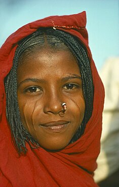 SUDAN  Tribal People Portrait of a young Eritrean woman with scarified cheeks and a nose ring