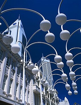 AUSTRALIA Western Australia Perth Angled view looking upwards through street lamps on Hay Street