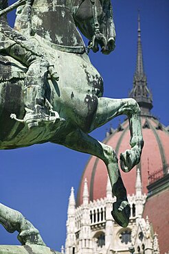 HUNGARY  Budapest Detail of equestrian statue  Rakoczi  with Parliament behind. Tourism Travel Holidays Neo Gothic Architecture Eastern Europe