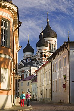 ESTONIA  Tallinn Two women walking through the Toompea district of the Old Town with Alexander Nevsky Cathedral in the background. Baltic States Travel Holidays Tourism