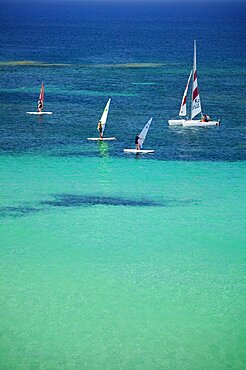 SPAIN Balearic Islands Ibiza Wind surfing at Platja des Pujols  Formentera.   Sunshine Beach Holidays Tourism