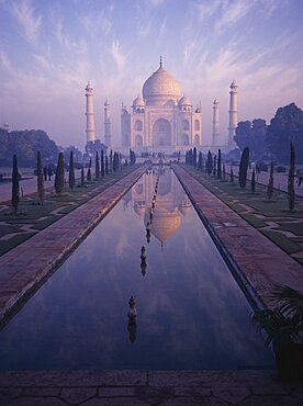 INDIA Uttar Pradesh Agra The Taj Mahal in pink misty light with the pool in the foreground