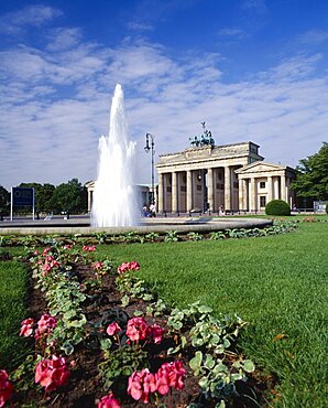 GERMANY  Berlin Brandenburg Gate formal gardens and fountain.